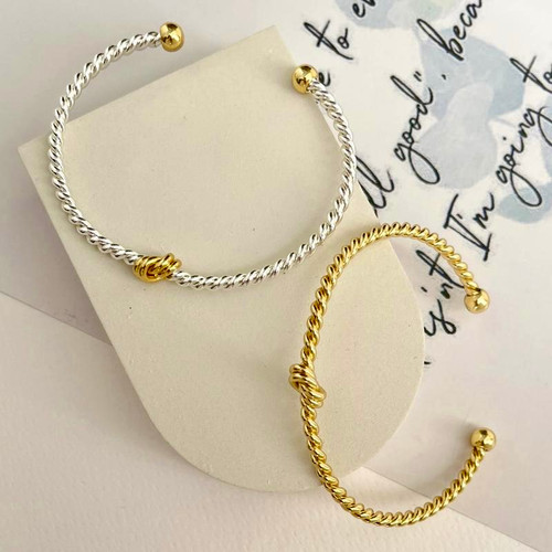 بنگل النگویی استیل طرح گره طلایی و نقره ای